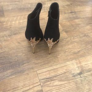 Beautiful Stylish Black Booties - new, never wore. They are a beauty.